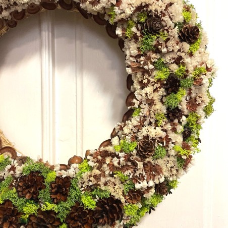 Dried flowers wreath with preserved moss