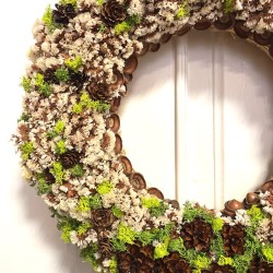 Dried flowers wreath with preserved moss