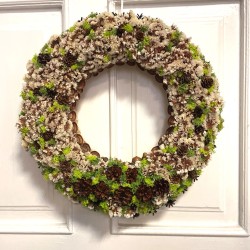 Dried flowers wreath with preserved moss